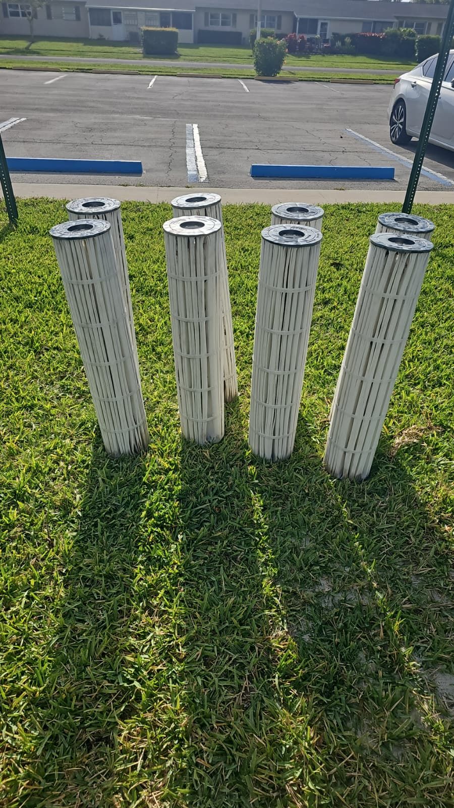 Clean replacement pool filter cartridges after service
