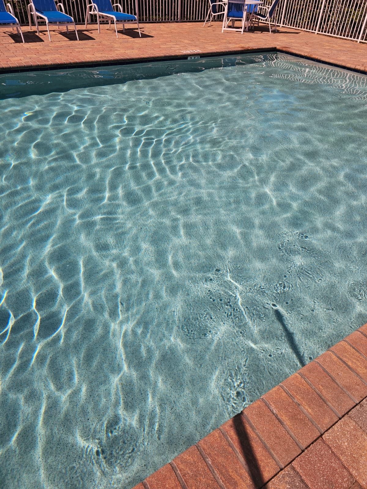 Clean, clear commercial pool maintained by Labounty Pools