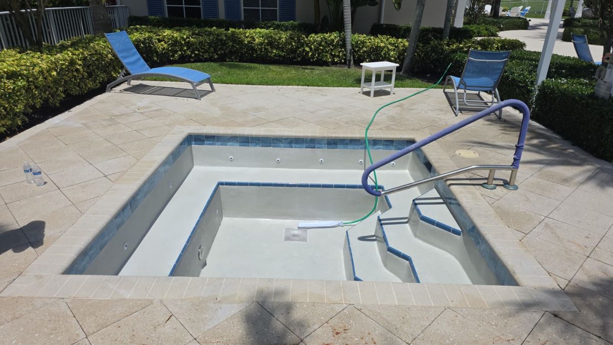Freshly resurfaced pool by Labounty Pools